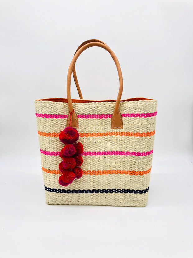 Shebobo - Capitola Sisal Basket Bag with Waterfall Pompoms - Pink Multi Pinstripes